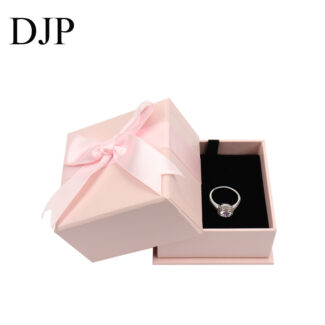 Pink bow jewelry box with black foam insert for ring and pendant packaging